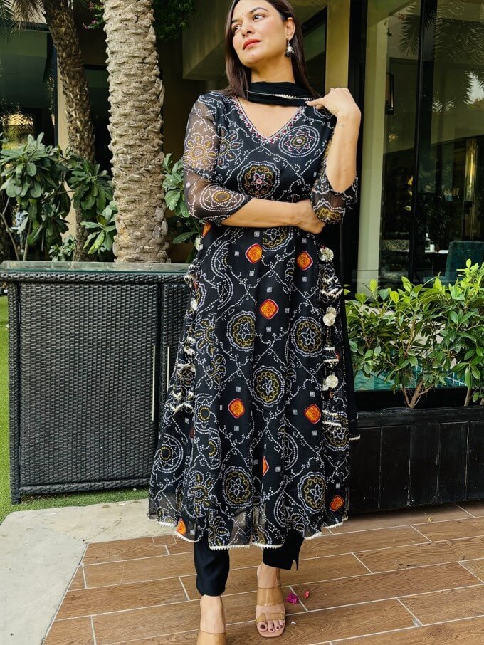 Upgrade your style with a Black Chiffon Bandhani Printed Anarkali Suit Set. image 2