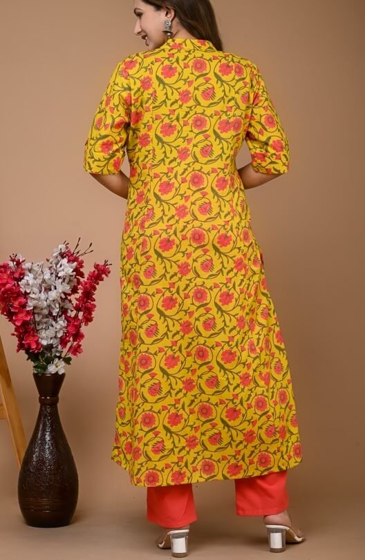 Add some sparkle with a yellow cotton kurta and pant set with floral prints. image 3