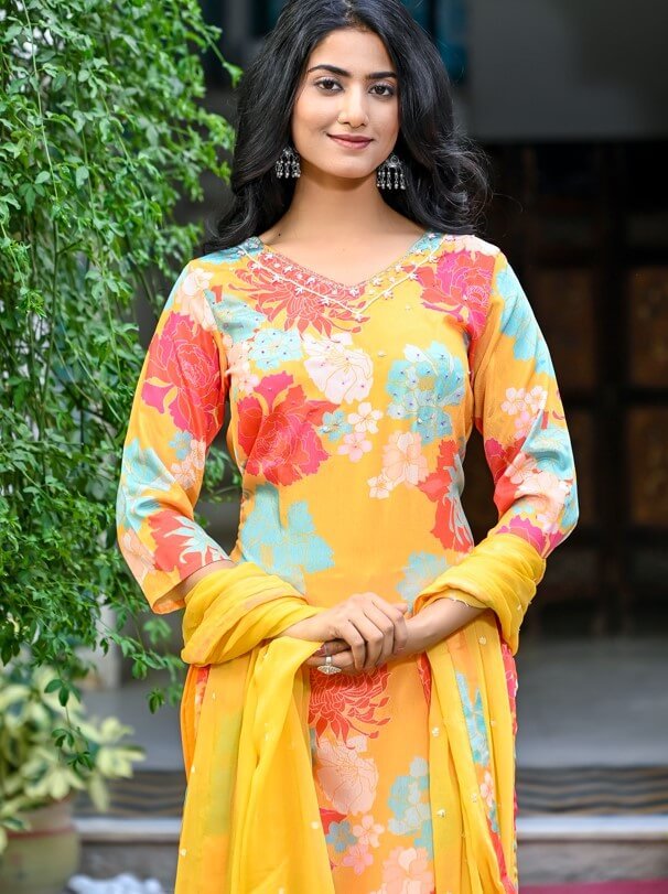 Experience the charm of the Yellow Floral Printed Chinnon Kurta Set. image 4