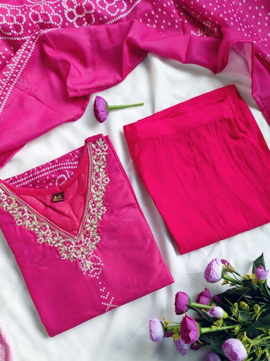Improve your style with a Magenta Pink Muslin Silk Bandhani Printed Kurta, paired with matching pants and a dupatta. image 4