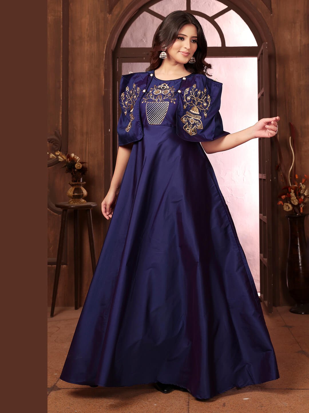 Improve Your Style with a Blue Silk Gown with Embroidery