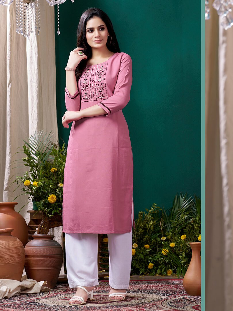 Wear Elegance with a Pink Cotton Kurti Featuring Handwork