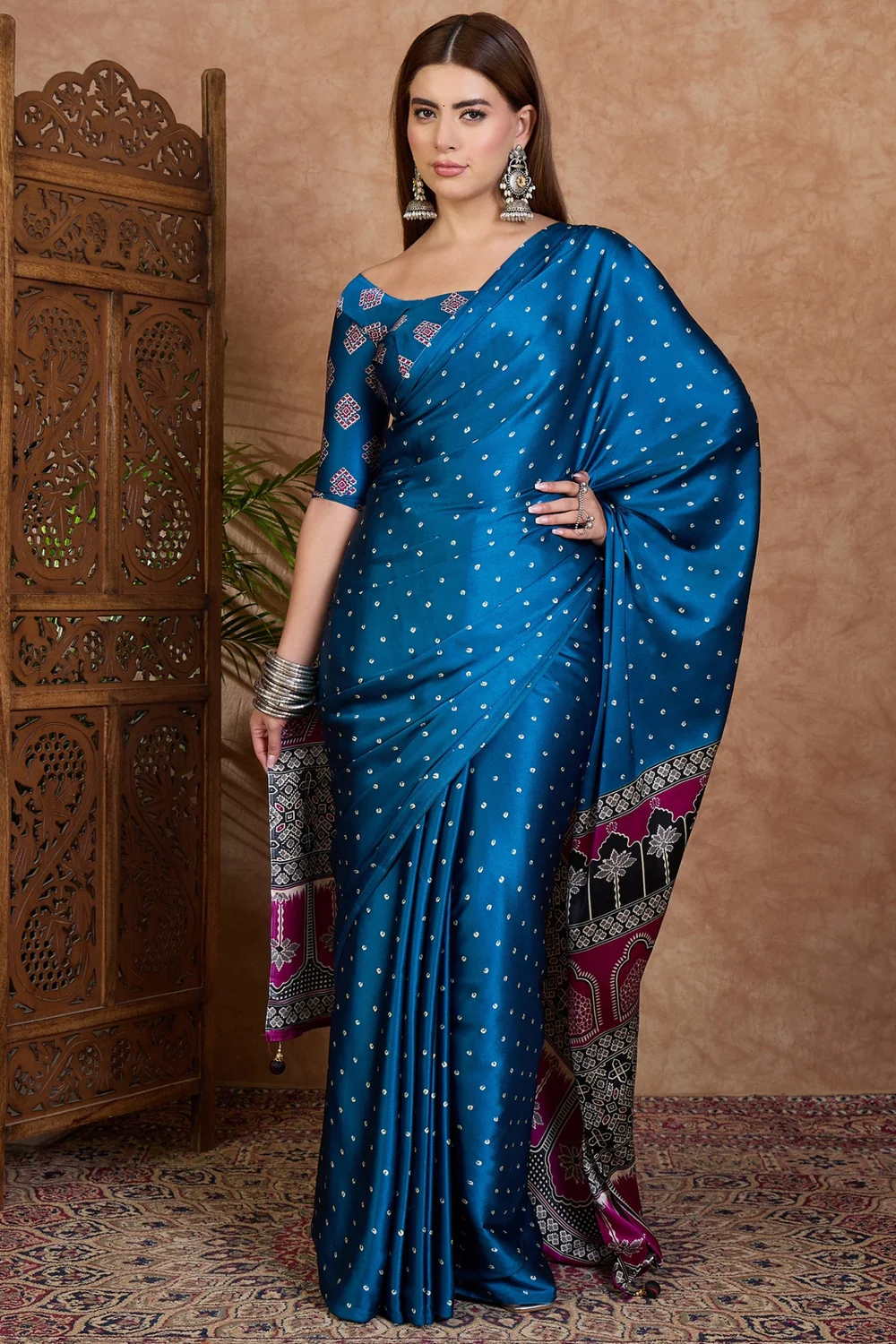 Look Stunning in a Peacock Blue Semi Modal Saree with Blouse Piece