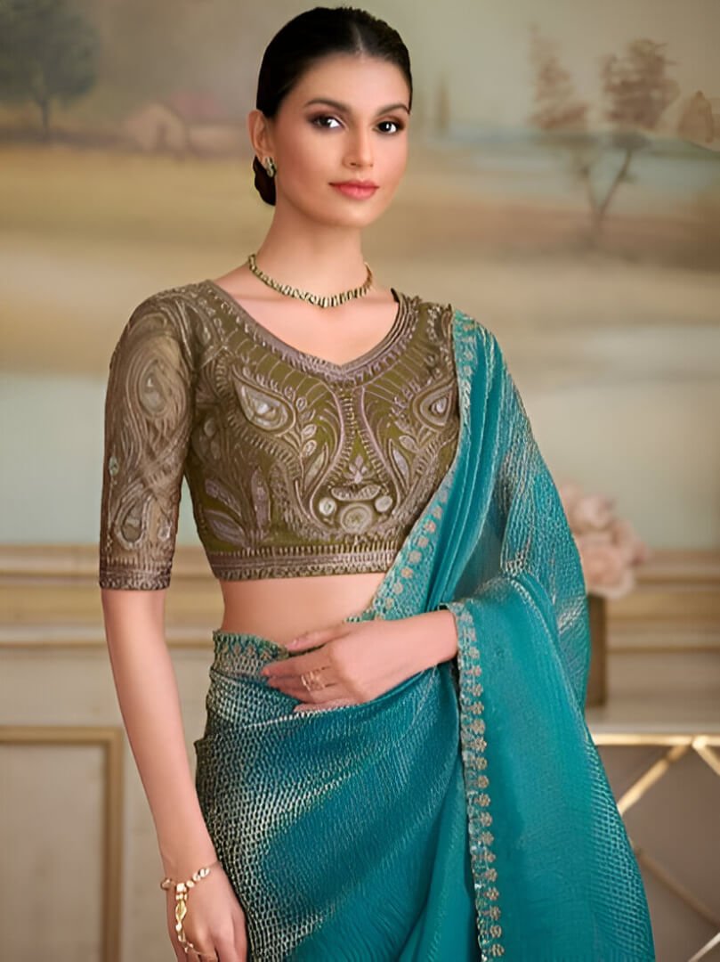 Look Stylish in a Blue Georgette Saree with a Contrasting Blouse image 2