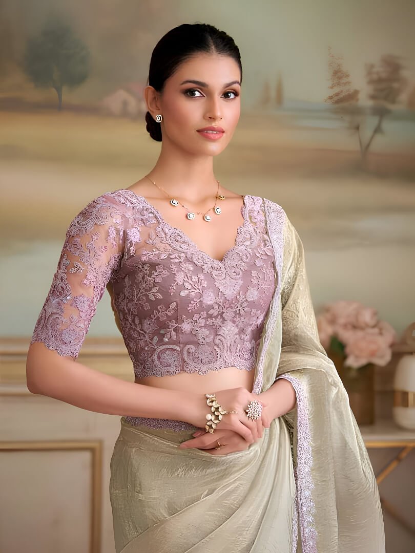 Stylish and elegant ivory georgette saree with a contrasting blouse. image 2