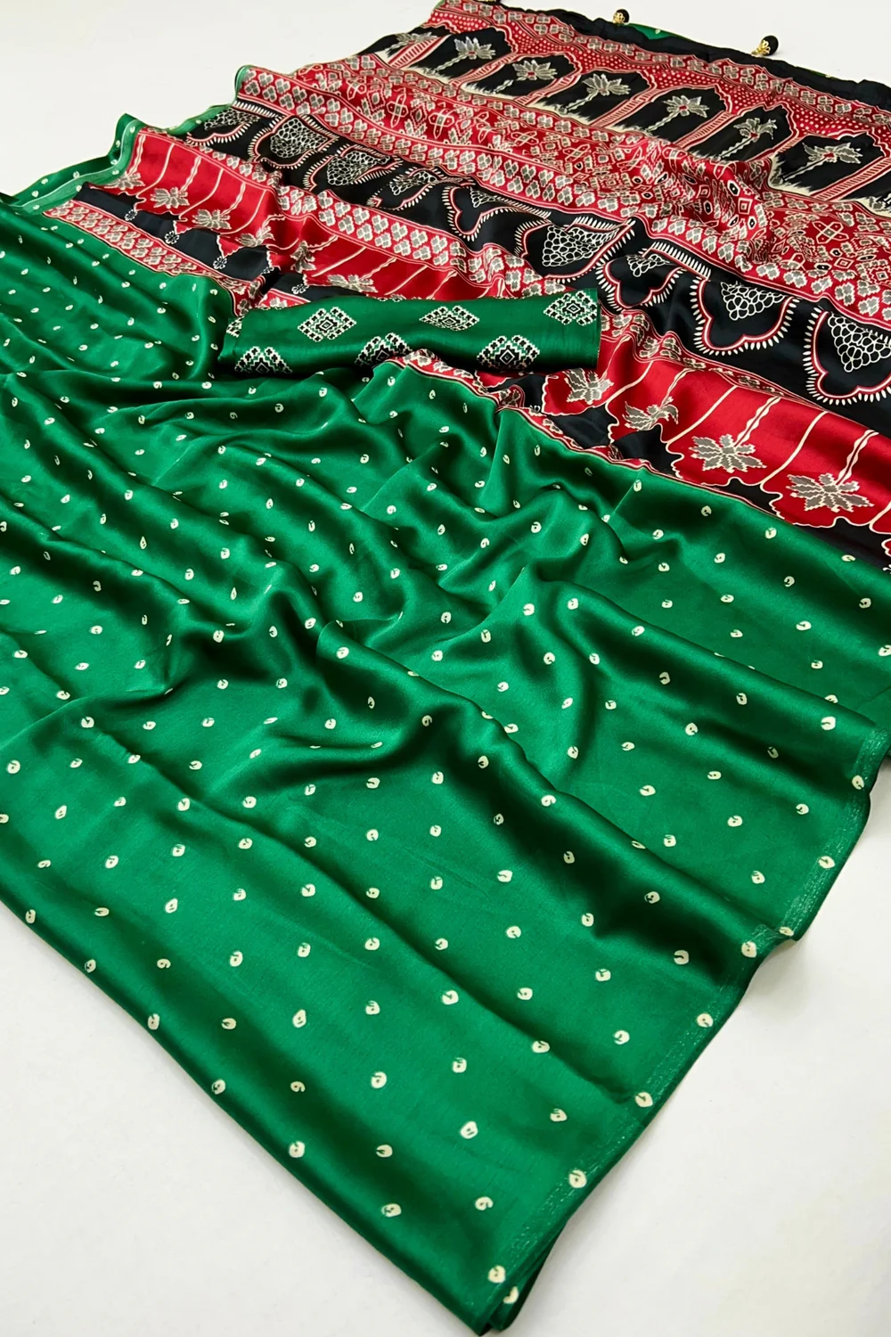 Step into style with a green semi-modal saree and blouse piece. image 5