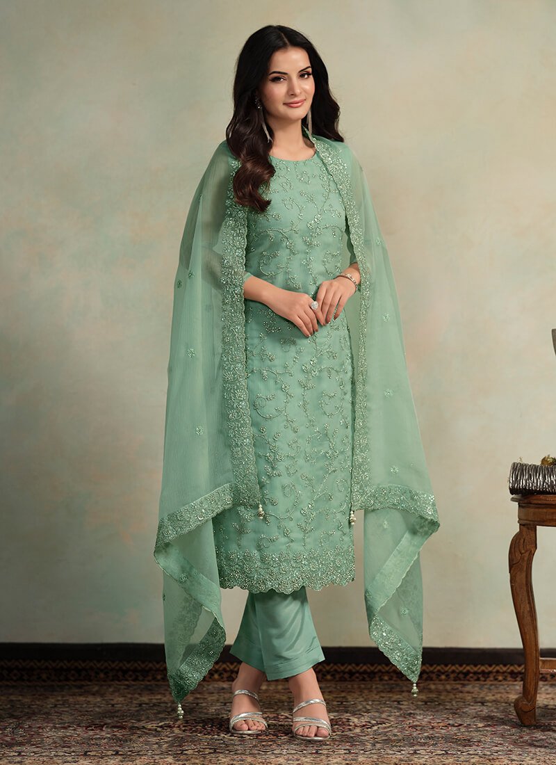Experience the elegance of the Green Embroidered Organza Chiffon Semi-Stitched Salwar Kameez Set.