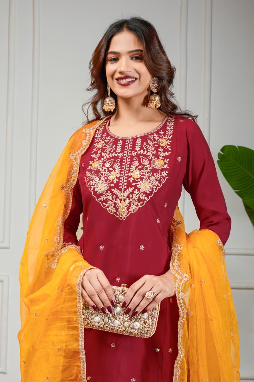Experience elegance with a maroon Roman silk Anarkali suit paired with a contrasting organza dupatta. image 2