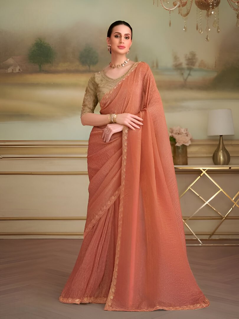 Add Glamour with a Rust Orange Georgette Saree and a Contrasting Blouse