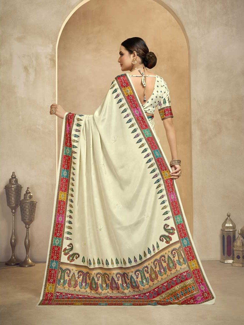 Look Stylish with a Cream Crape Saree and Foil Print Blouse image 2