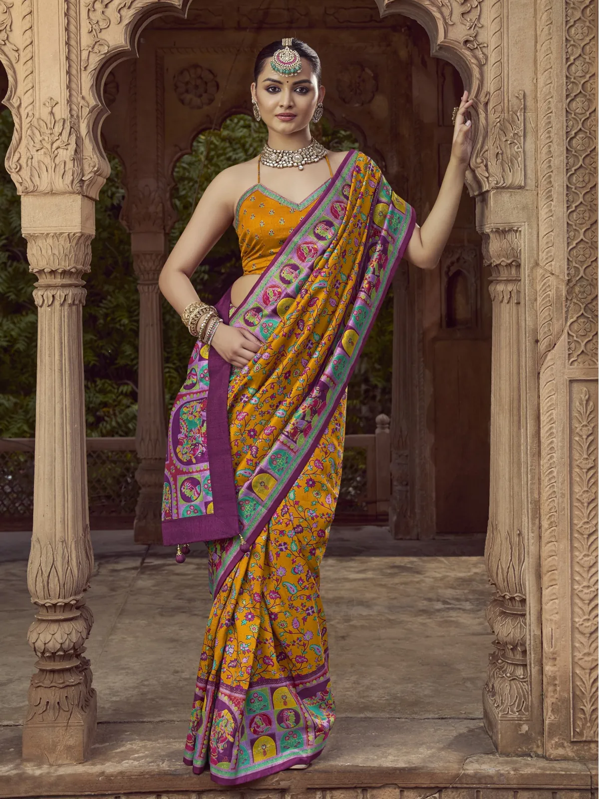 Glow and sparkle with a Yellow Pashmina Printed Viscose Silk Saree and Blouse.
