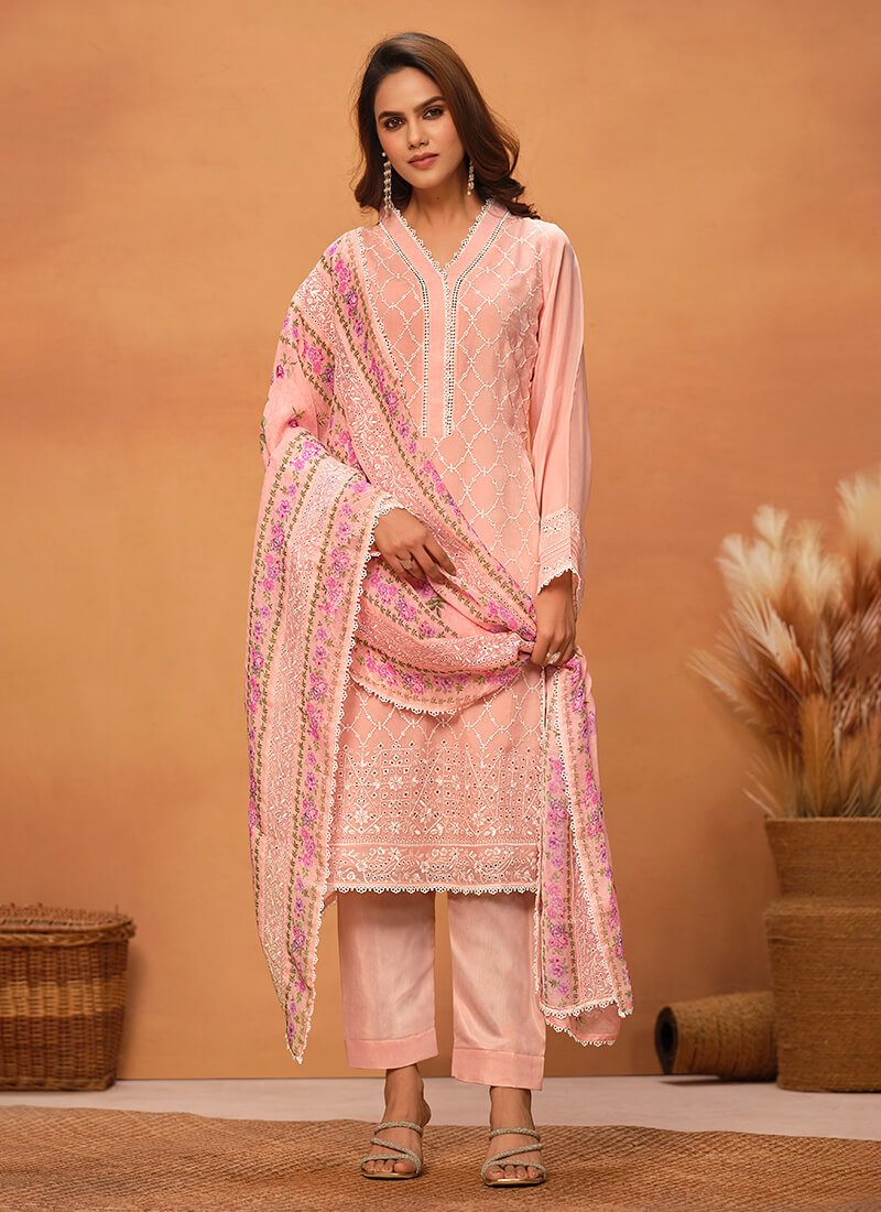 Look fabulous with the Peach Chikankari Viscose Organza Semi-Stitched Salwar Kameez Set.