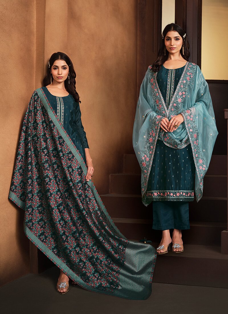 Feel fabulous in the Kerosene Blue Embroidered Chinnon Semi-Stitched Salwar Kameez Set with Double Dupatta.