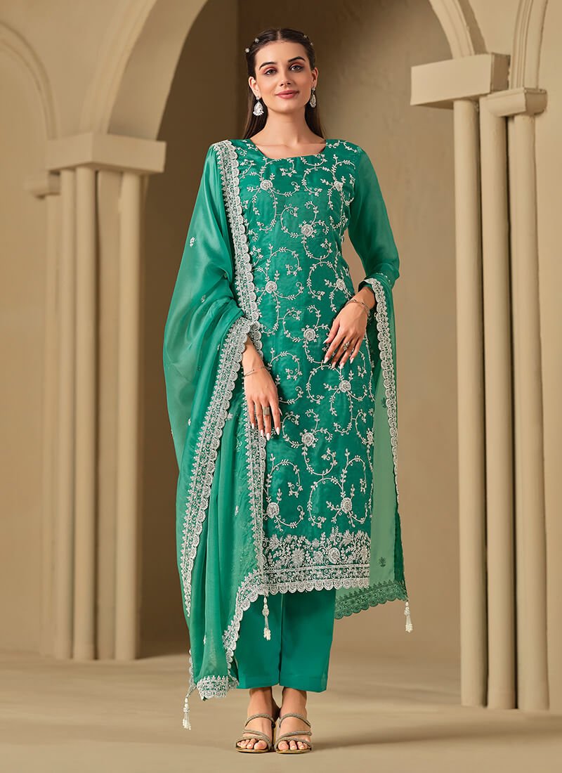 Brighten your look with the Rama Green Embroidered Swarovski Organza Semi-Stitched Salwar Kameez Set.