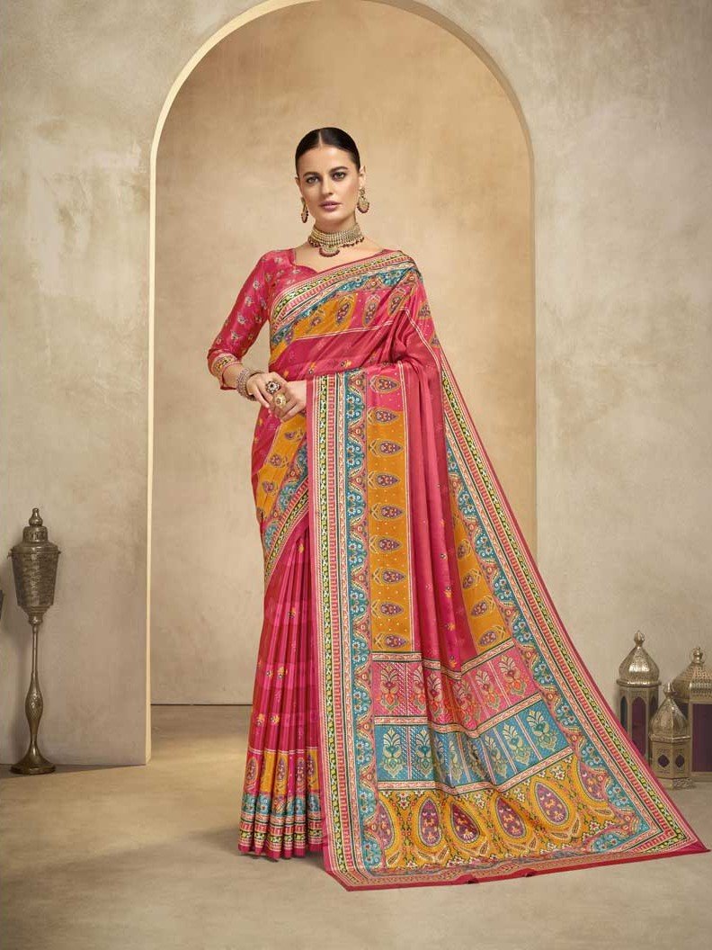 Improve your style with a bright pink crape saree with foil print and matching blouse.