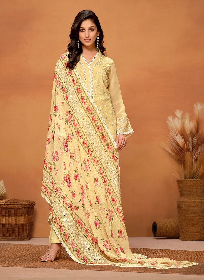 Experience the elegance of the Yellow Chikankari Viscose Organza Semi-Stitched Salwar Kameez Set.