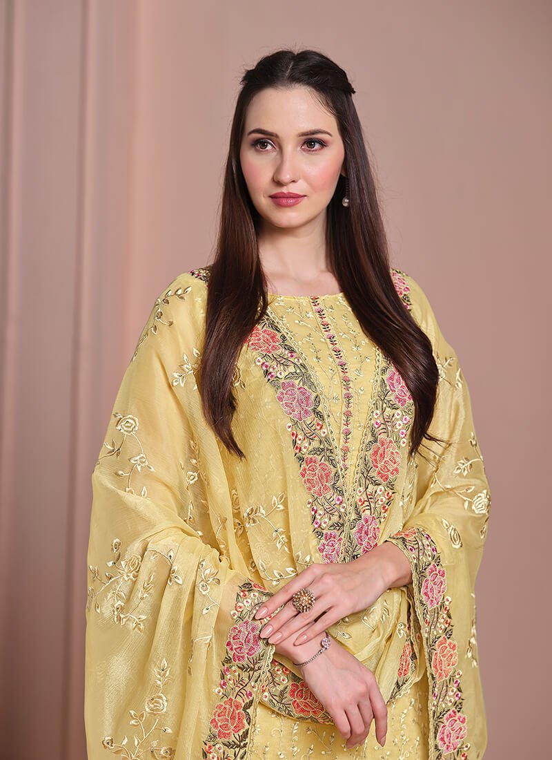 Experience the elegance of the Yellow Embroidered Chiffon Semi-Stitched Salwar Kameez Set. image 2