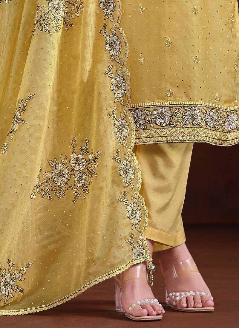 Add some sparkle with a yellow embroidered organza semi-stitched Salwar Kameez set. image 3