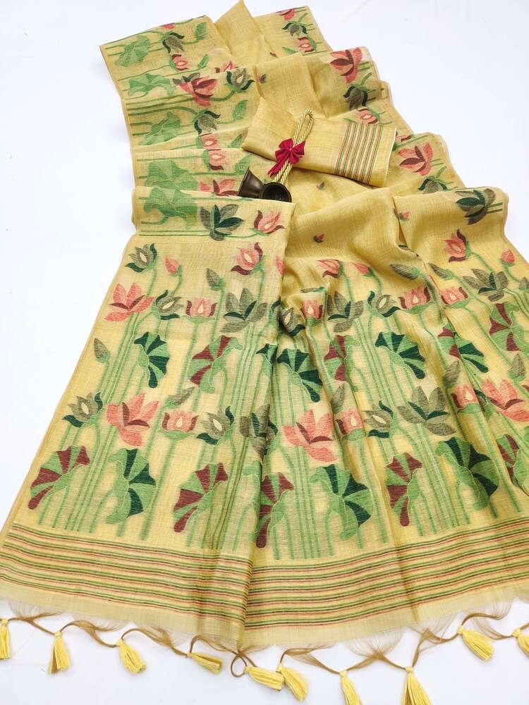 Add some sparkle with a yellow Muga cotton saree and matching blouse.