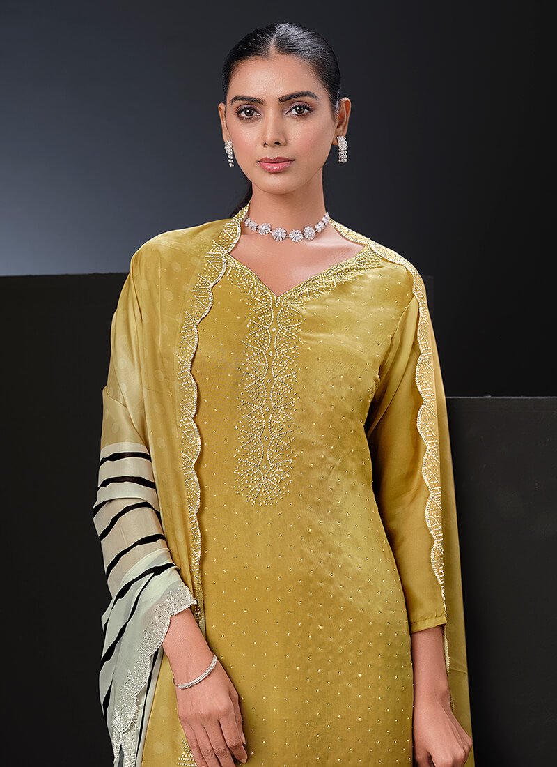 Upgrade your style with a yellow satin semi-stitched salwar kameez set. image 2