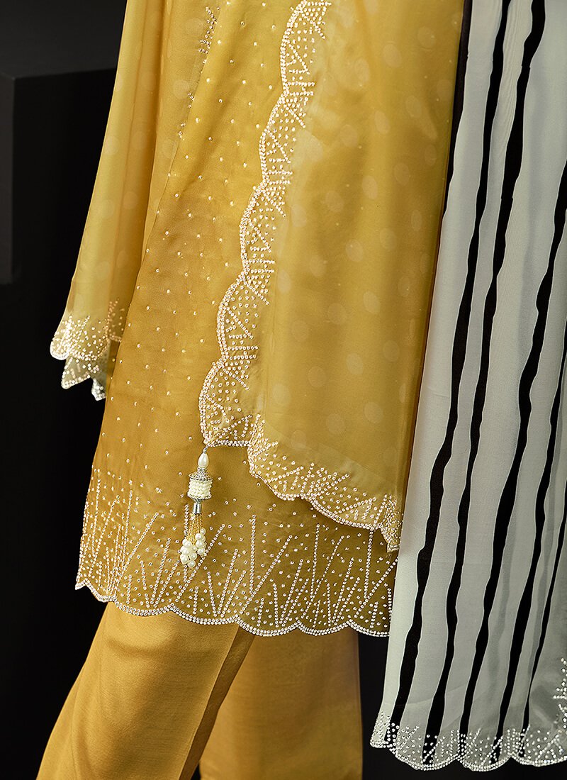Upgrade your style with a yellow satin semi-stitched salwar kameez set. image 3