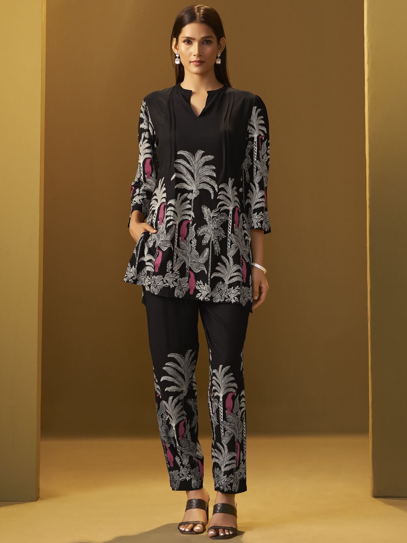 Look fabulous in a black floral printed rayon co-ord set.