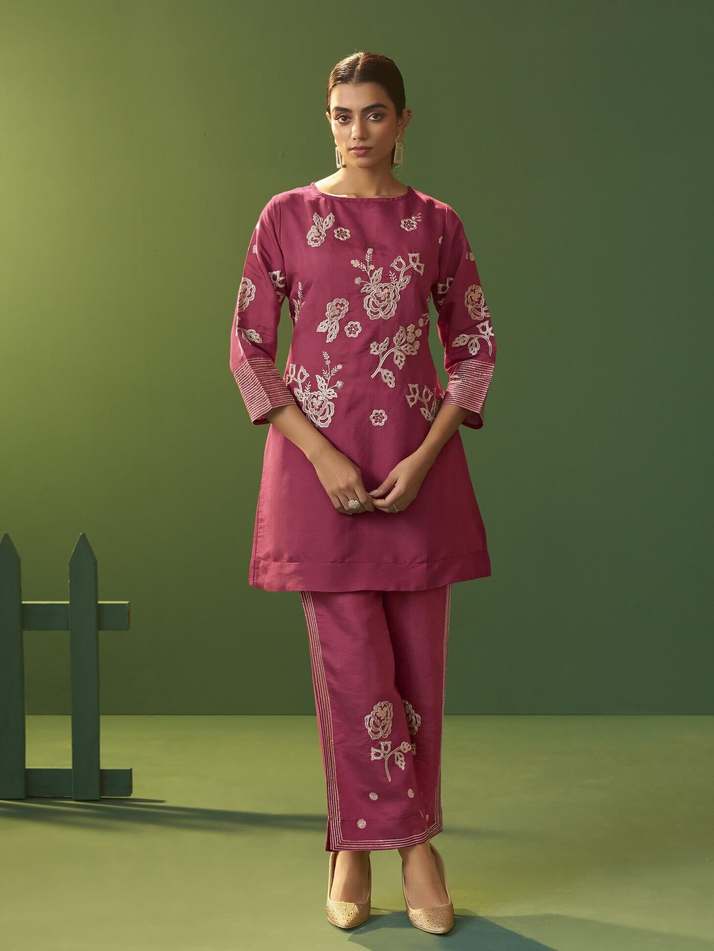 Boost your style with a bright pink embroidered Roman silk co-ord set.