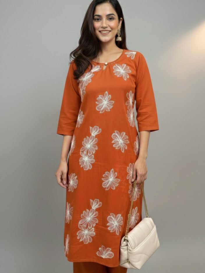 Experience the elegance of a rust-colored cotton kurti with matching pants. image 2