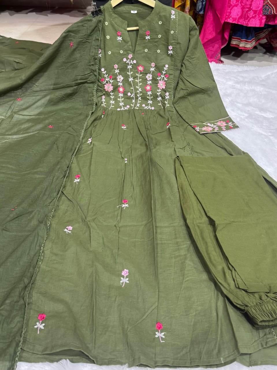 Enjoy the elegance of a green cotton kurti with embroidery, paired with pants and a soft mulmul dupatta. image 3