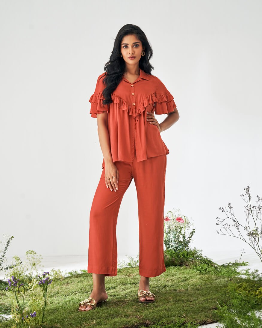 Get Stylish with the Orange Viscose Rayon Slub Solid Ruffle Top and Matching Set