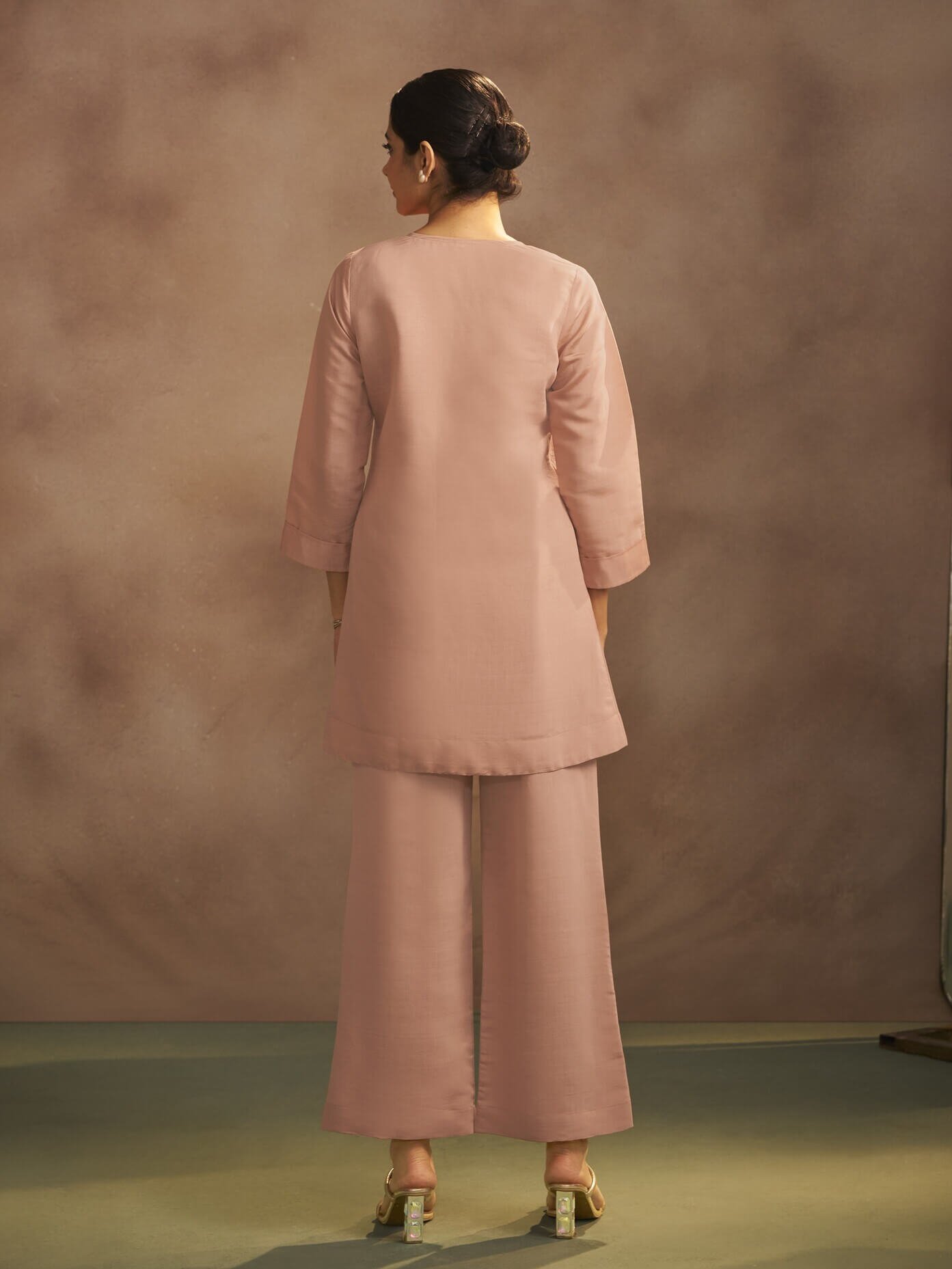 Improve your style with a peach-colored Roman silk co-ord set with embroidery. image 2