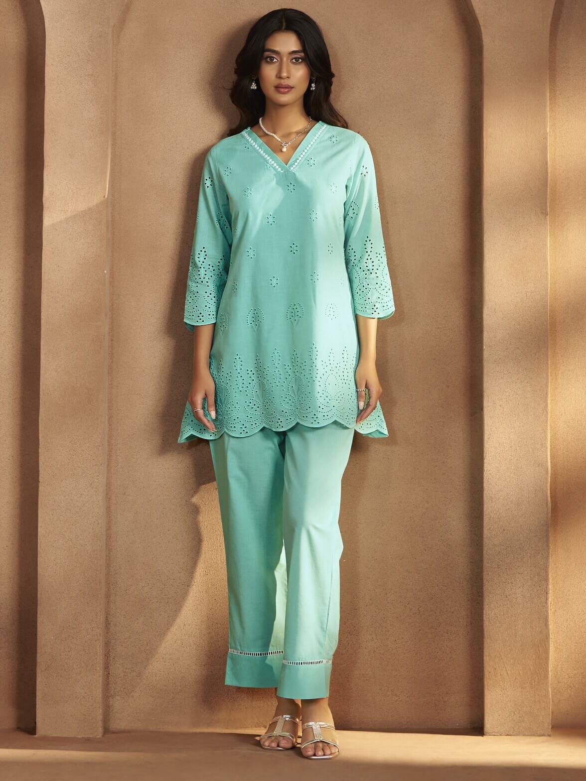 Experience the beauty of the Aqua Blue Floral Schiffli Cotton Co-Ord Set.
