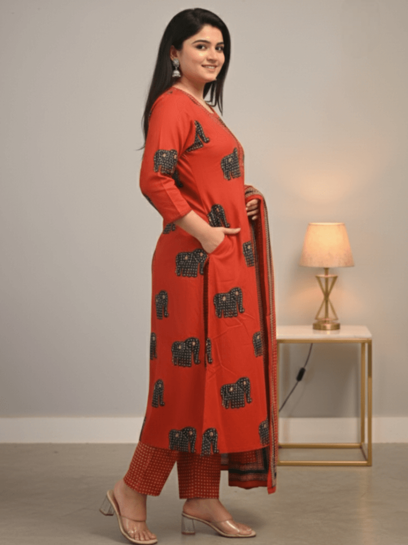 Step into style with a red animal print cotton kurta, pant, and dupatta set. image 2