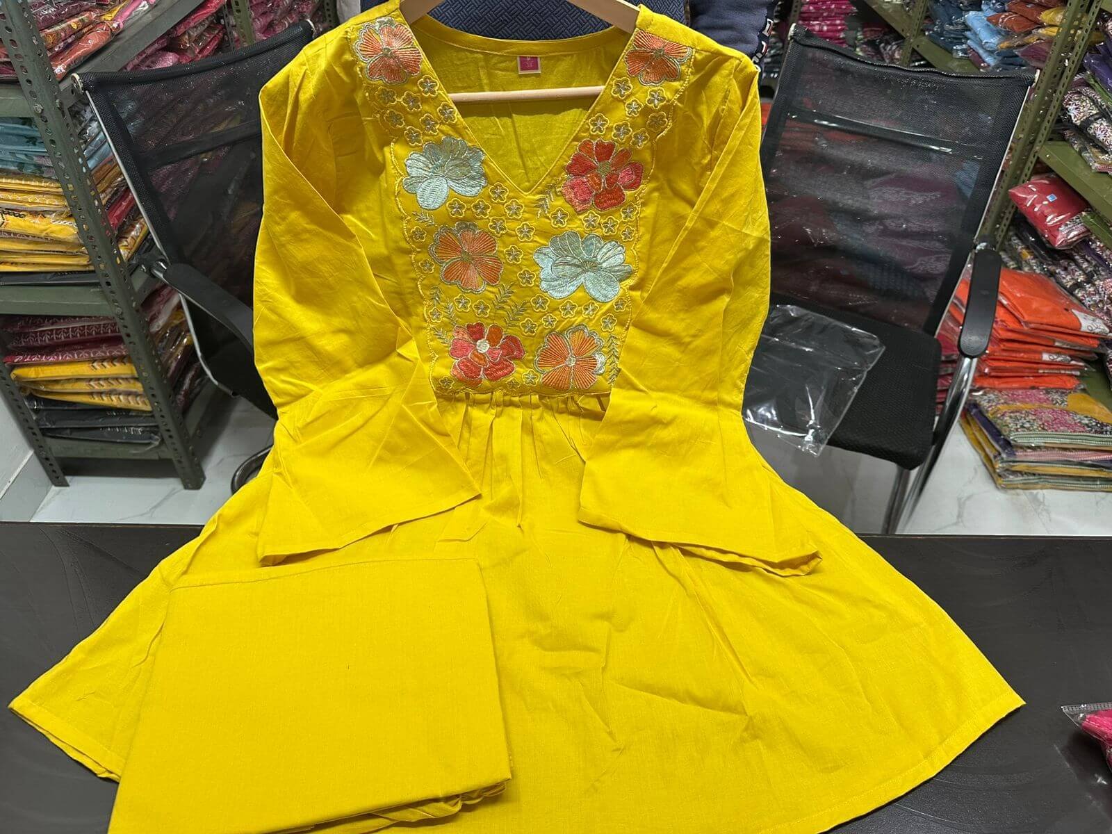Put on your style with a yellow cotton embroidered matching set. image 2