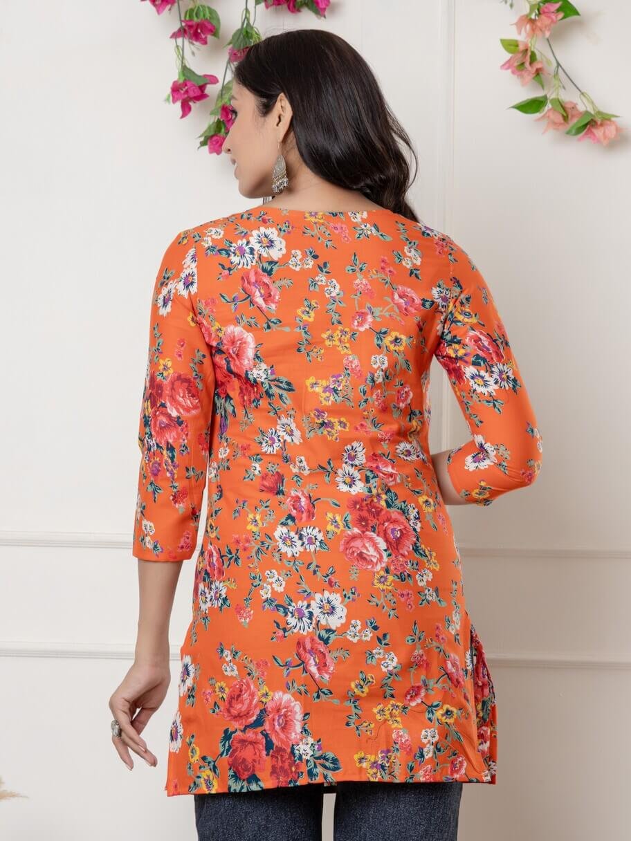 Brighten Your Look with an Orange Cotton Floral Short Kurti image 3